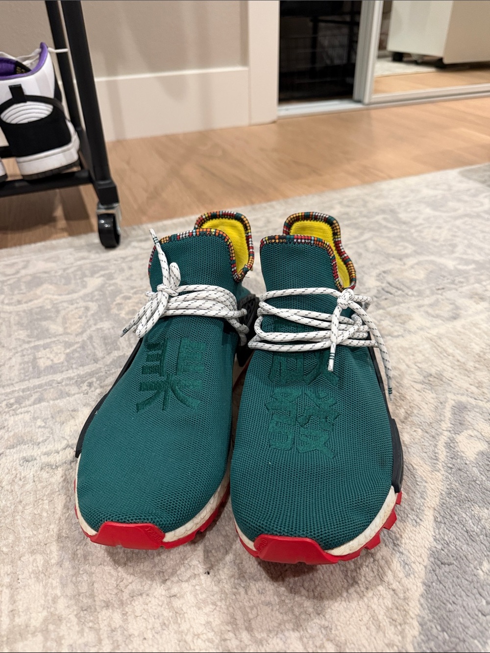 adidas Teal Knit Sneakers with Red and Yellow Accents